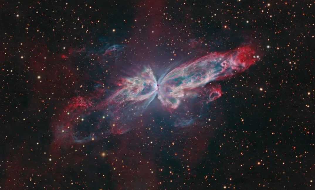 The Butterfly Nebula (NGC 6302): A Fiery Cosmic Chrysalis in Scorpius