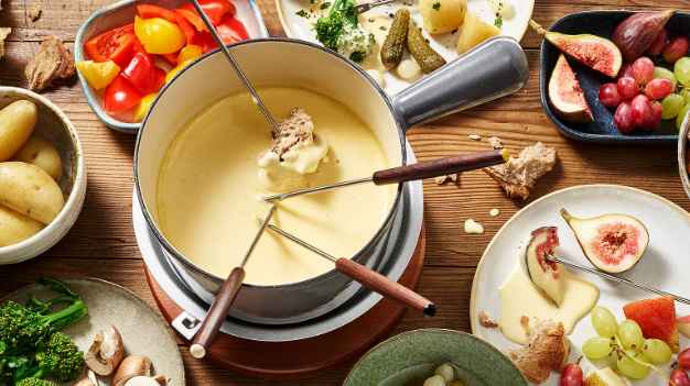 Switzerland's Fondue: From Kitchen Tradition to National Cultural Icon
